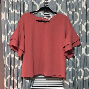 Cute coral top with ruffle sleeves